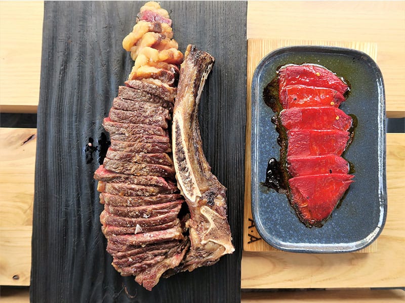 Arima Basque Gastronomy Txuleta de vaca con pimientos del Piquillo Arima Basque Gastronomy Txuleta de vaca con pimientos del Piquillo